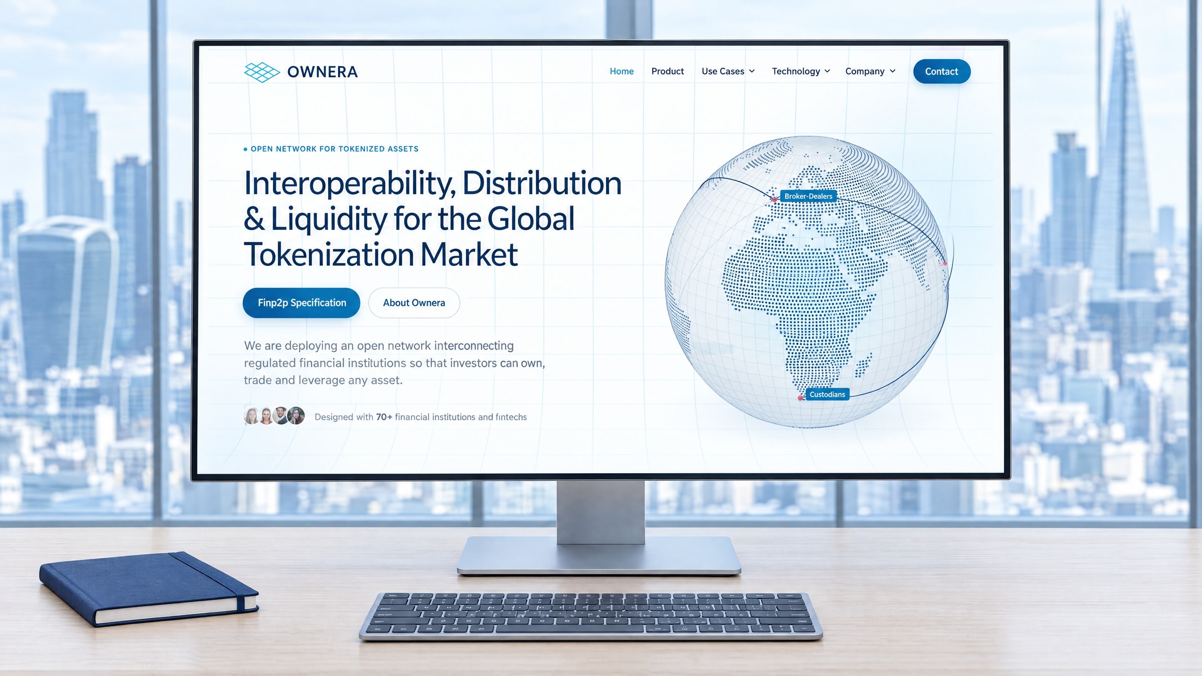 The Ownera home page on a large desktop display on an oak desk, floor-to-ceiling glass and the towers of a financial district out of focus behind it