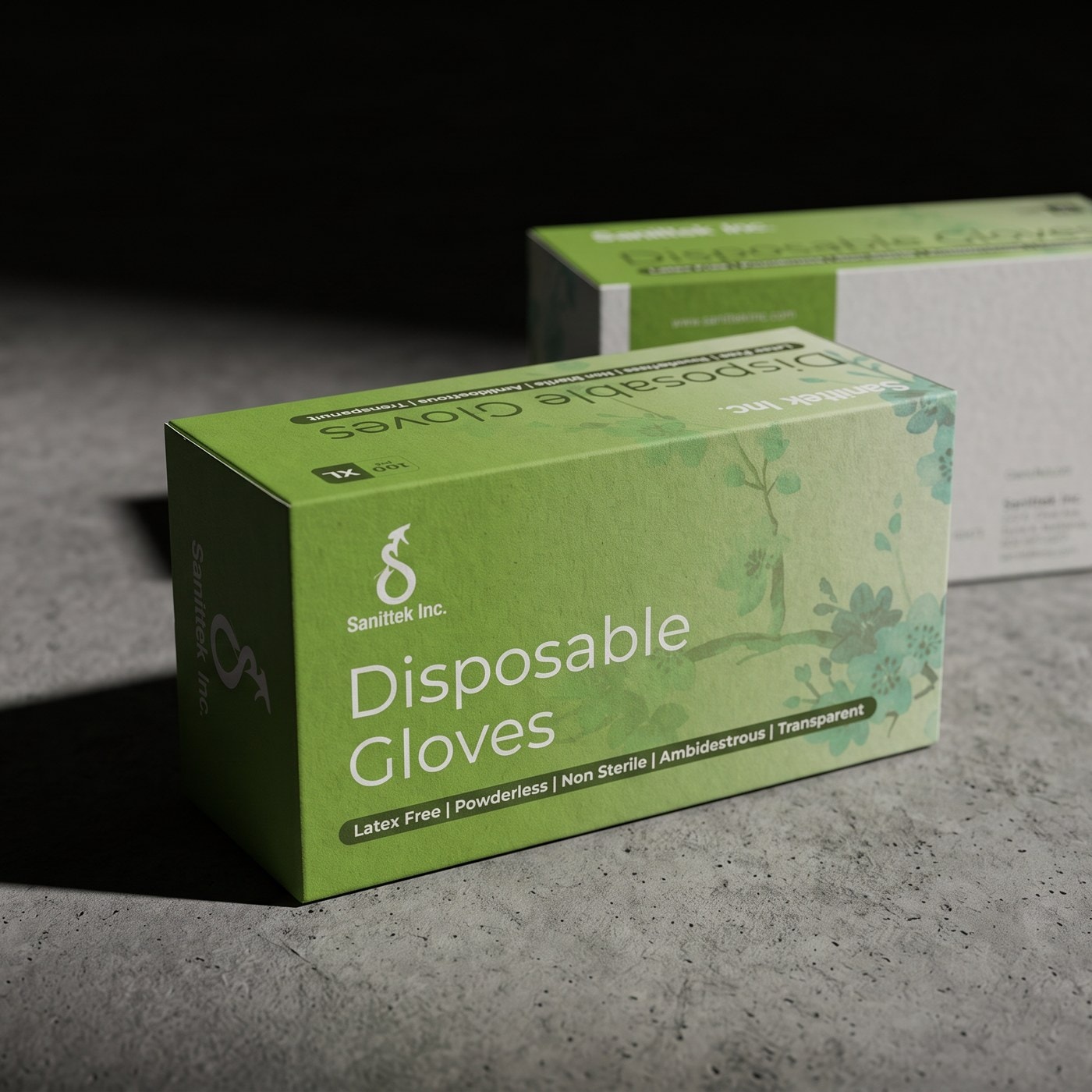 A green Sanittek disposable-glove carton on concrete, a second box behind it in shadow.