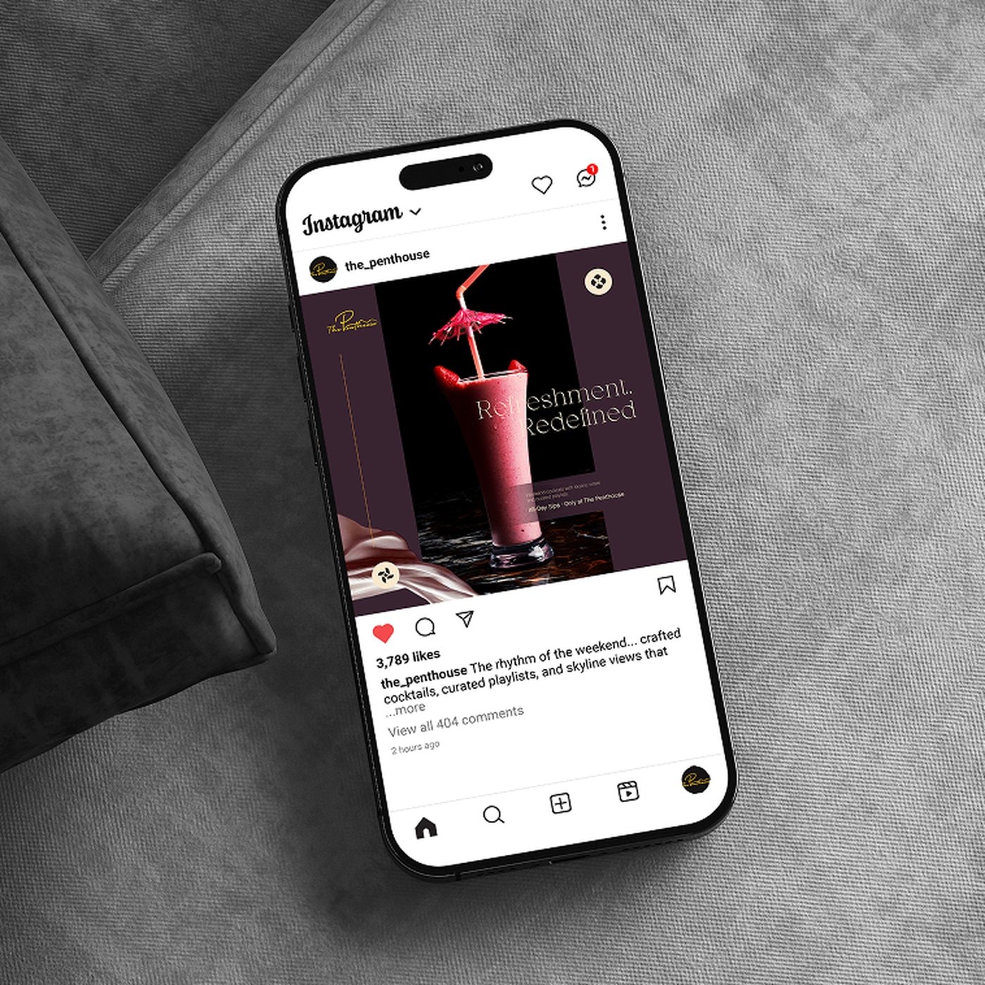 A Penthouse post shown in an Instagram feed on a phone resting on grey velvet.
