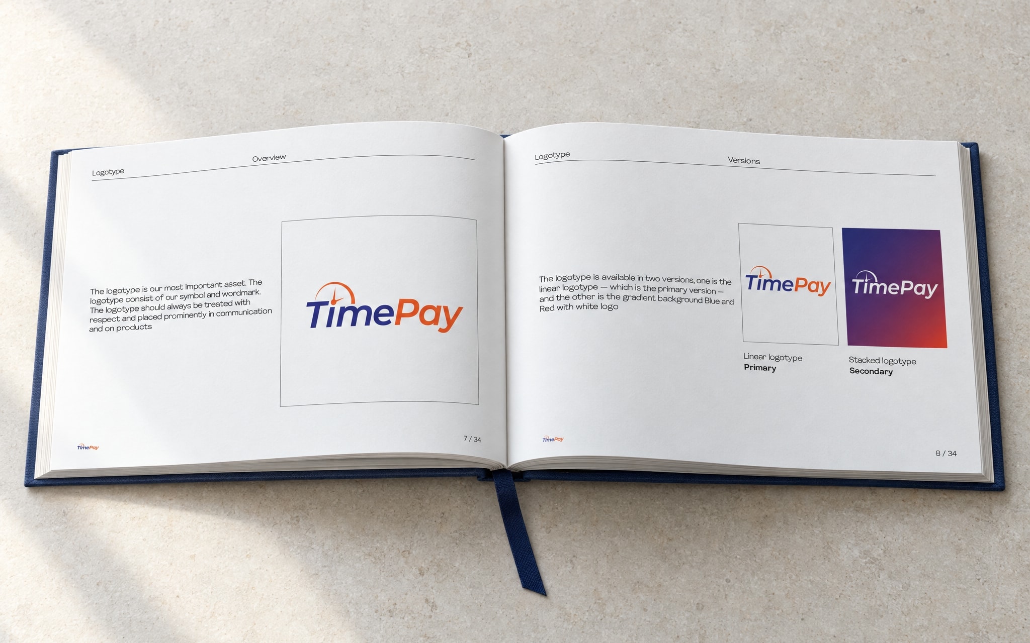 The brand guidelines book open at the logotype spread: the primary mark on the left page, the linear and stacked lockups on the right