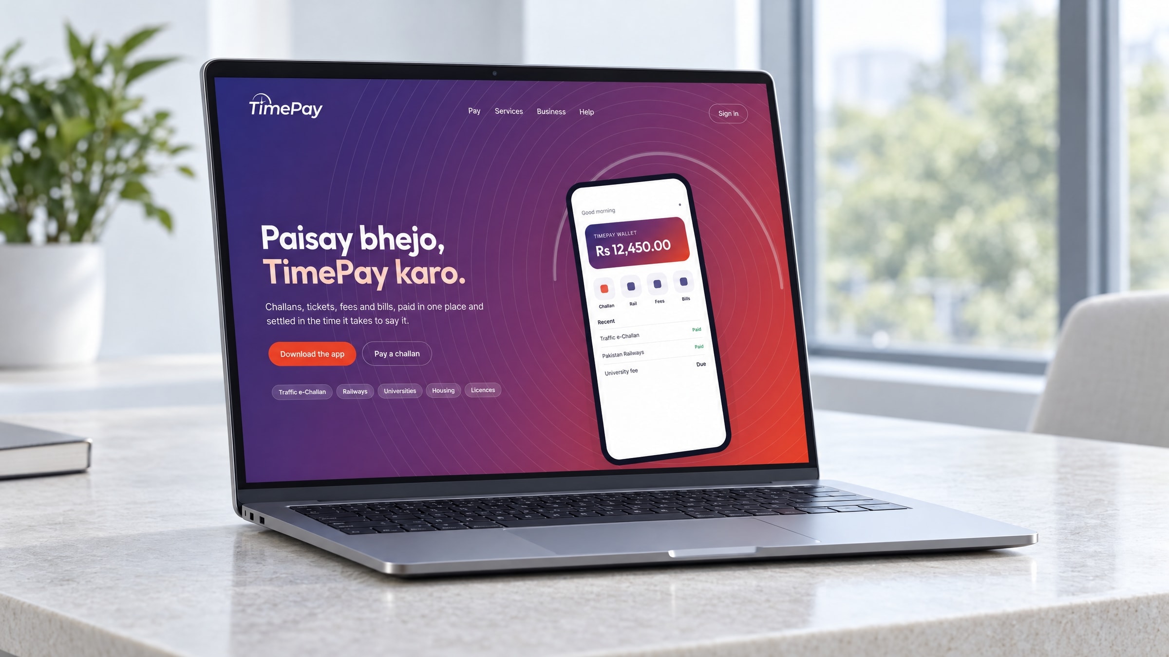 The TimePay website on a laptop on a pale stone table in a bright office, a plant and a window behind