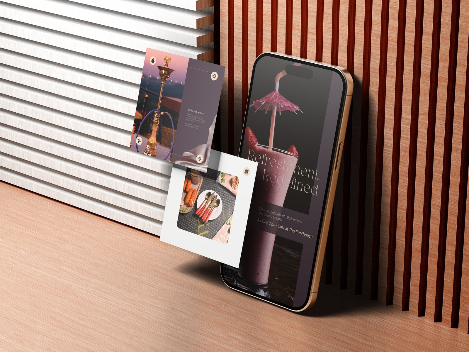 A phone and two printed cards from The Penthouse system, propped against a slatted wood wall.